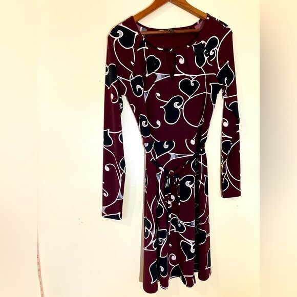 Ann Taylor Dresses & Skirts - Ann Taylor long sleeve, mini dress, excellent condition, detail at neck, size XS